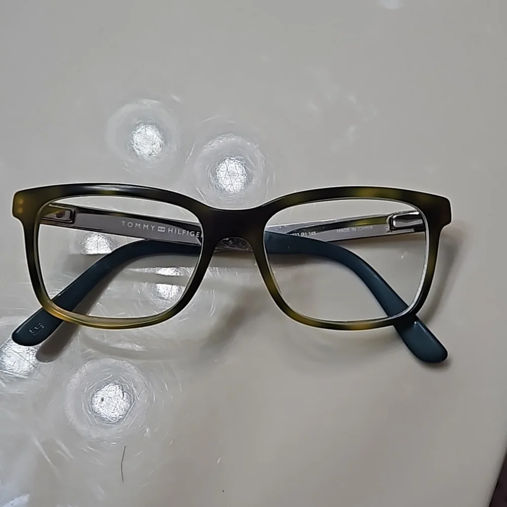 Tommy Hilfiger yellow and brown plastic frame glasses with case.